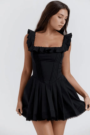 Vestido corto negro plisado